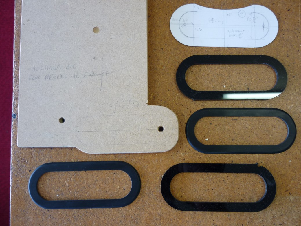 Pickup surrounds: completed and Mark's blanks plus the holding jig that I used to file and sand the edges then polish the completed surround. Brian preferred the polished look rather than the 1200 grit fine sanded matte look