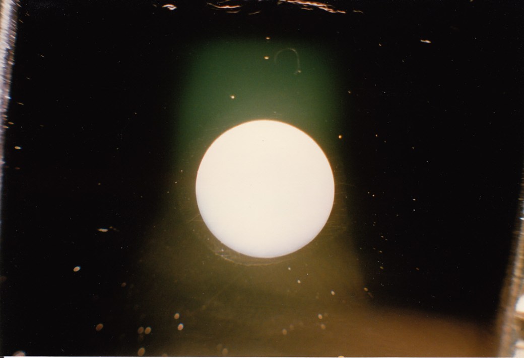 Red Special new 5th fret dot sanded and polished level with the surface. The egg shaped 'crater' that the former red wooden dot was sitting in can be seen here due to the reflection of the light in this photograph. The mother of pearl dot was handmade using the original handmade mehtod and tool that Brian used for the making of his original fingerboard dots from pearl buttons.