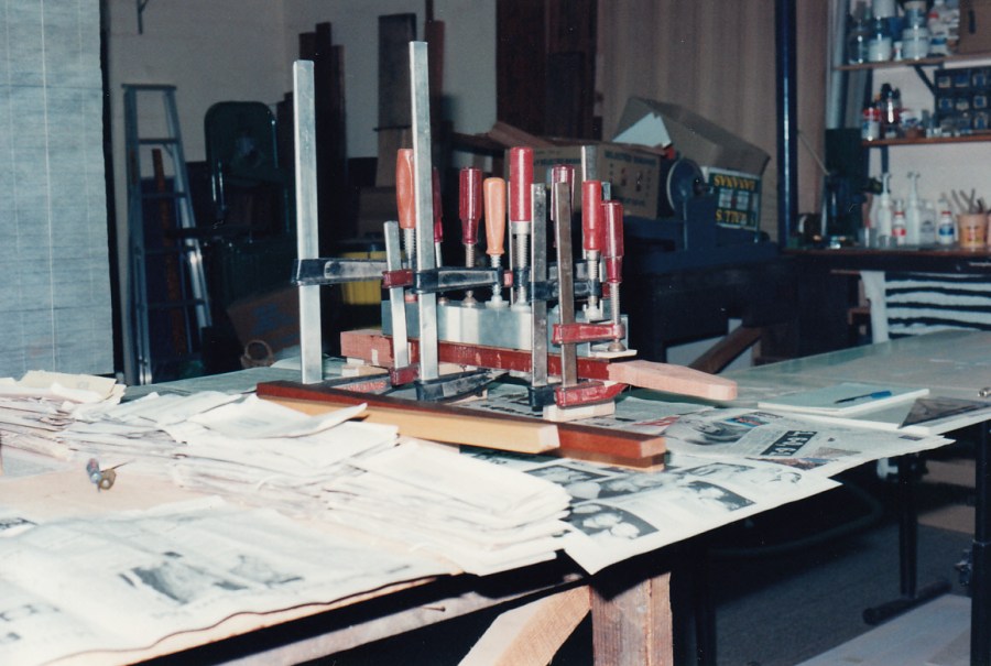 George's fingerboard being glued and clamped
